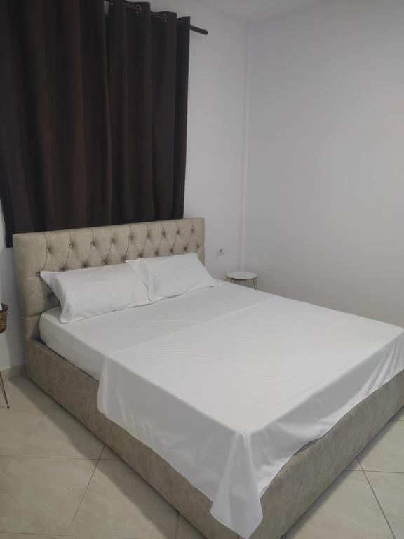 Postel nebo postele na pokoji v ubytování Memo House