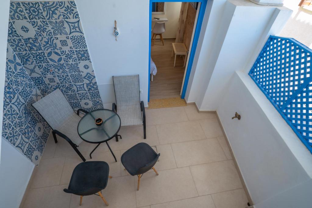 Posezení v ubytování gdk house in the heart of Aegina