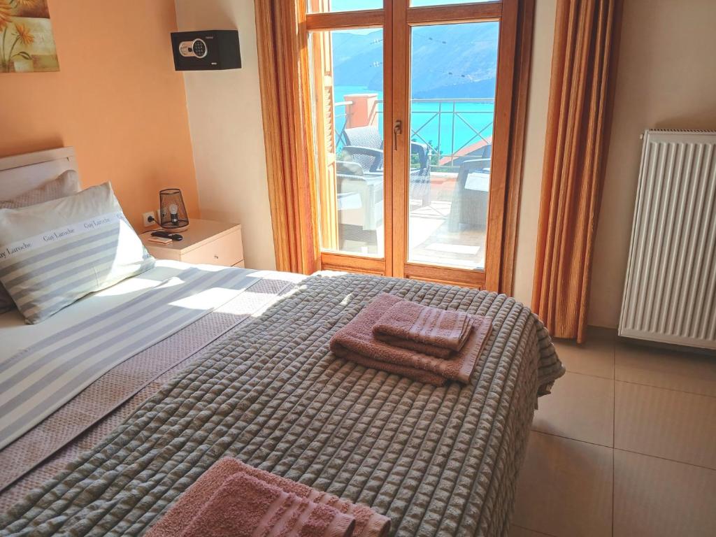 Postel nebo postele na pokoji v ubytování Villa Alexandros