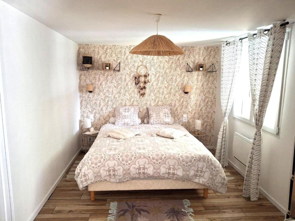 Postel nebo postele na pokoji v ubytování Le 421, Maison d'hôtes Jacuzzi entre amis,familles