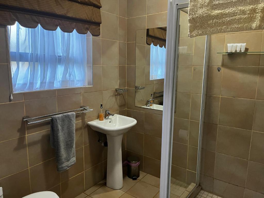 Koupelna v ubytování Matthys Guesthouse