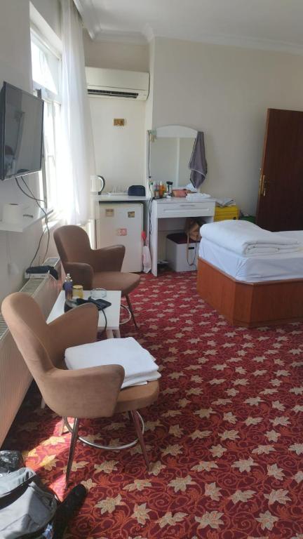 TV a/nebo společenská místnost v ubytování Hotel Birkent