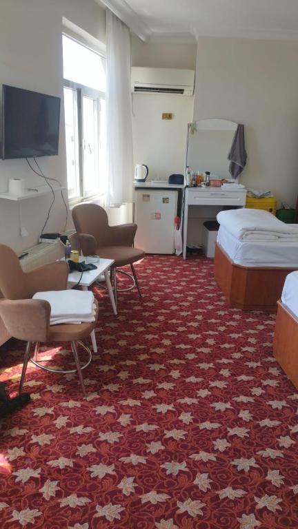 Kuchyň nebo kuchyňský kout v ubytování Hotel Birkent