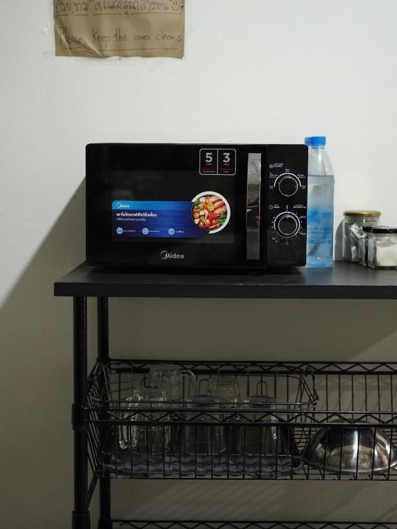 TV a/nebo společenská místnost v ubytování Ai guesthouse