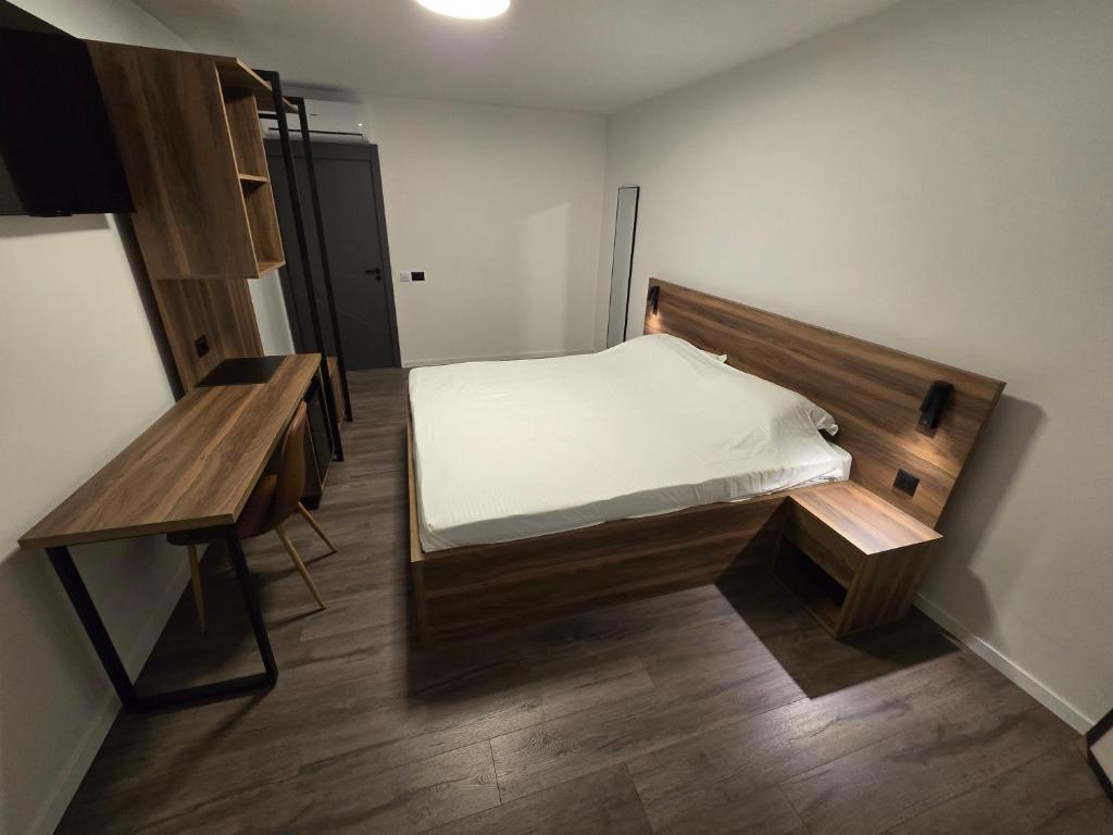 Postel nebo postele na pokoji v ubytování Fole Apart Hotel