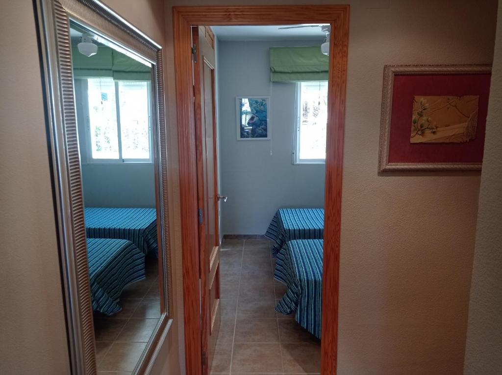 Postel nebo postele na pokoji v ubytování Los Juncos Solo Familias Serviplaya