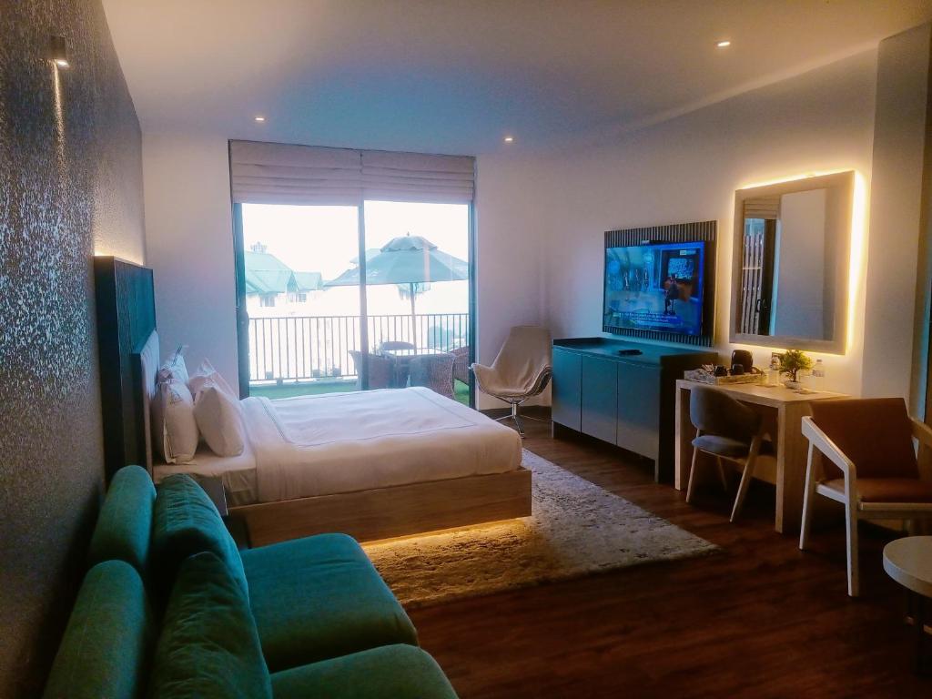 TV a/nebo společenská místnost v ubytování Highland Stonehouse Luxury Boutique Hotel