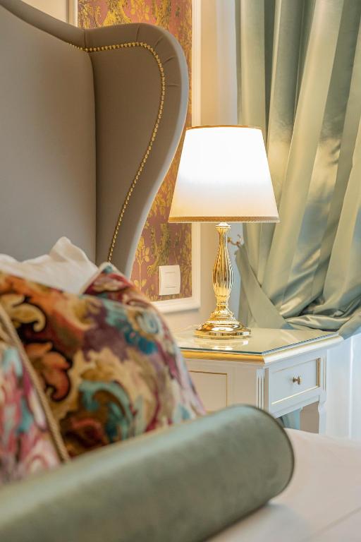 Posteľ alebo postele v izbe v ubytovaní Palazzo Monga Boutique Guesthouse
