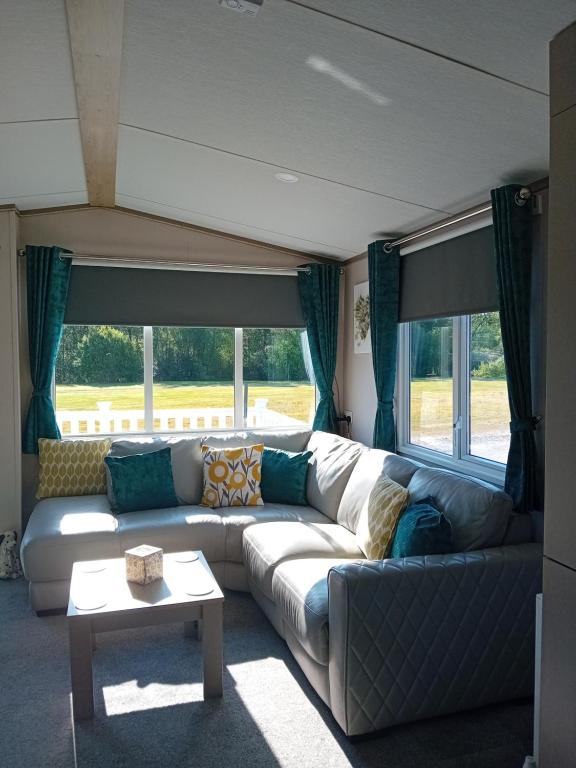 Posezení v ubytování Luxury Static Caravan