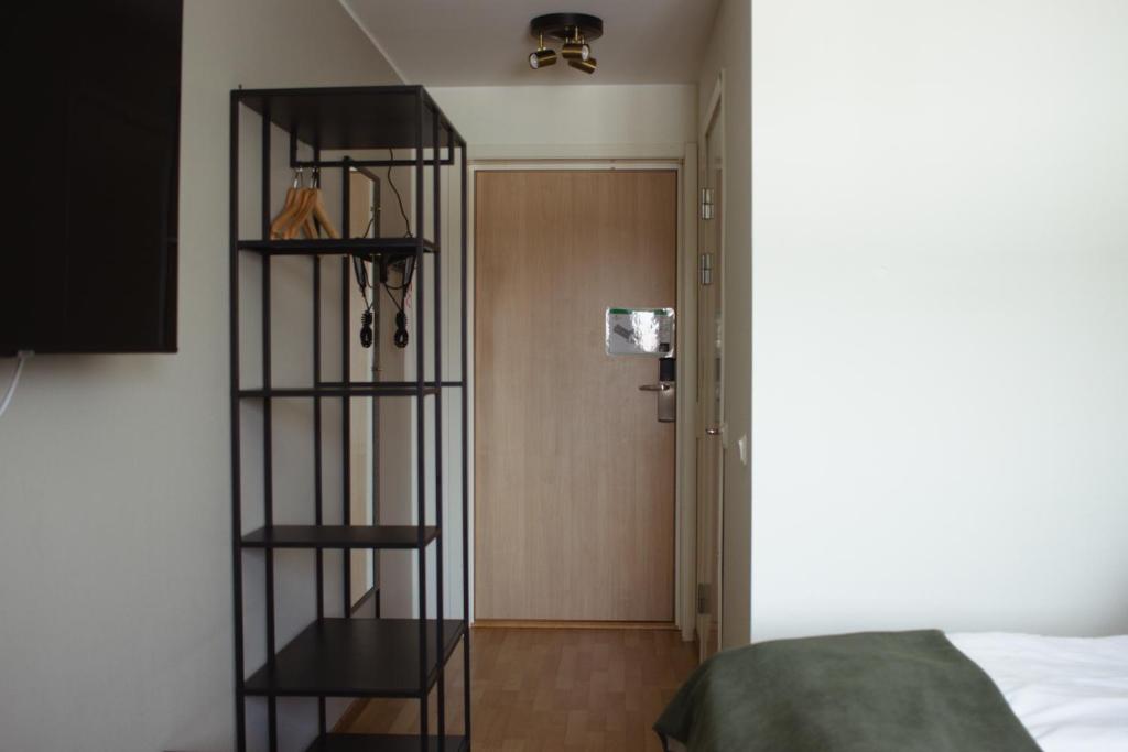 Postel nebo postele na pokoji v ubytování Hornavan Hotell