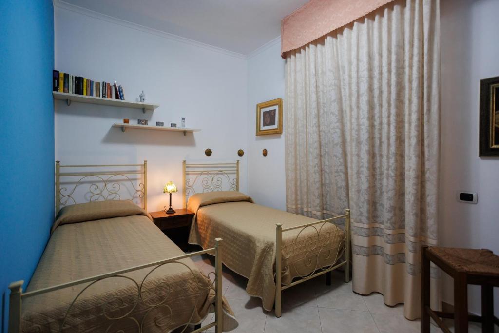 Posteľ alebo postele v izbe v ubytovaní The Lemon Tree House