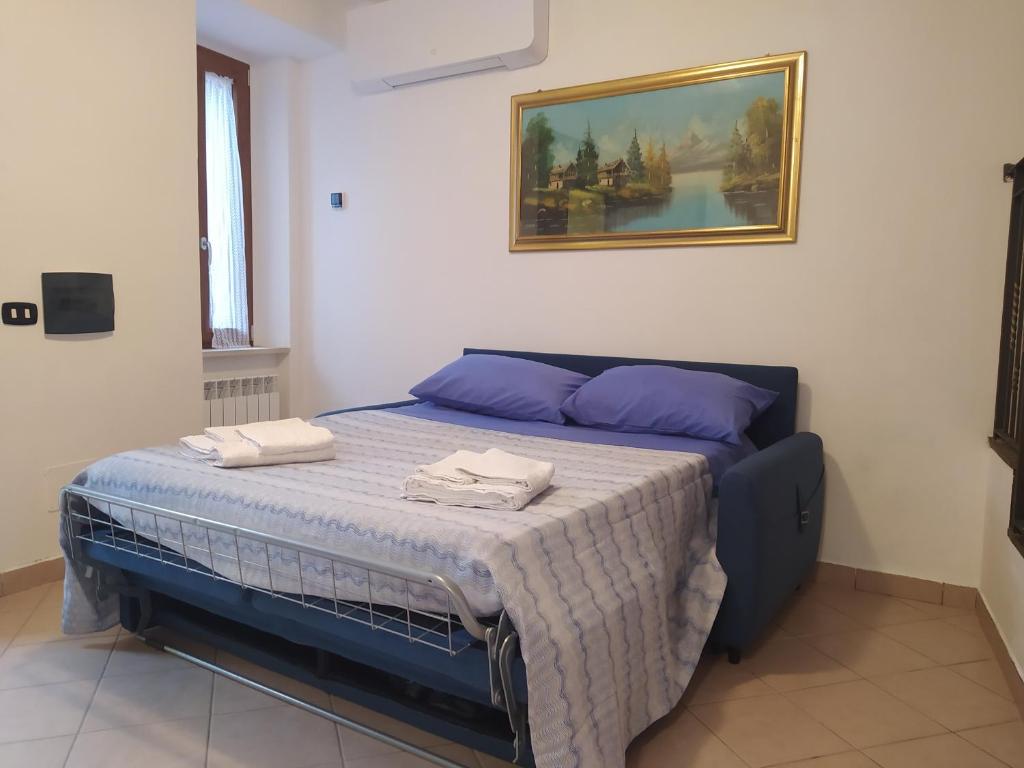 Postel nebo postele na pokoji v ubytování Antico Borgo - Via Napoli, 2