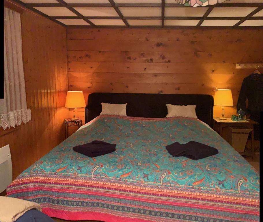 Letto o letti in una camera di La Cure de Vernamiège