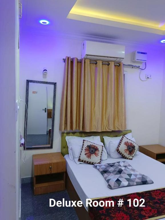 Letto o letti in una camera di Le Majestic Serenity Inn
