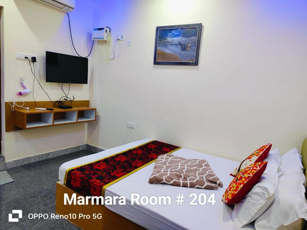 Letto o letti in una camera di Le Majestic Serenity Inn
