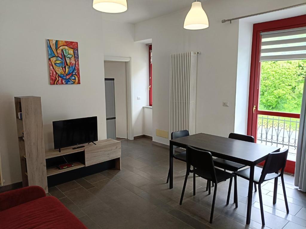 Televízia a/alebo spoločenská miestnosť v ubytovaní Liberty House Alps