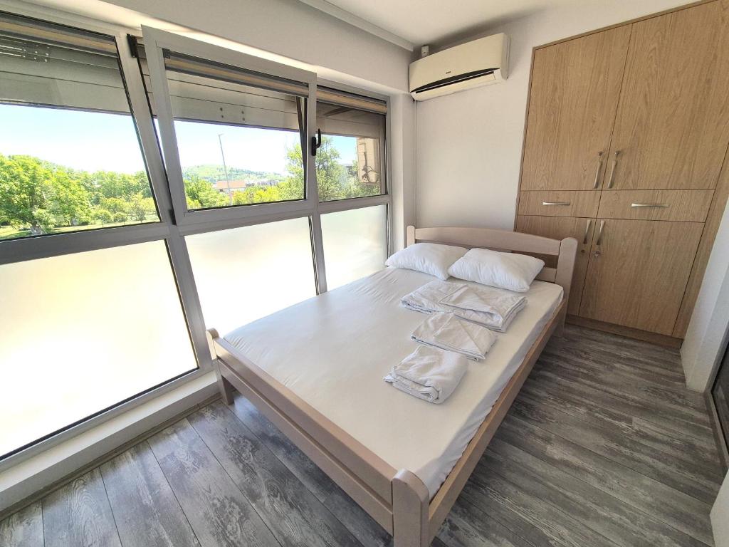 Postel nebo postele na pokoji v ubytování AdriaMont - Rooms & Coworking