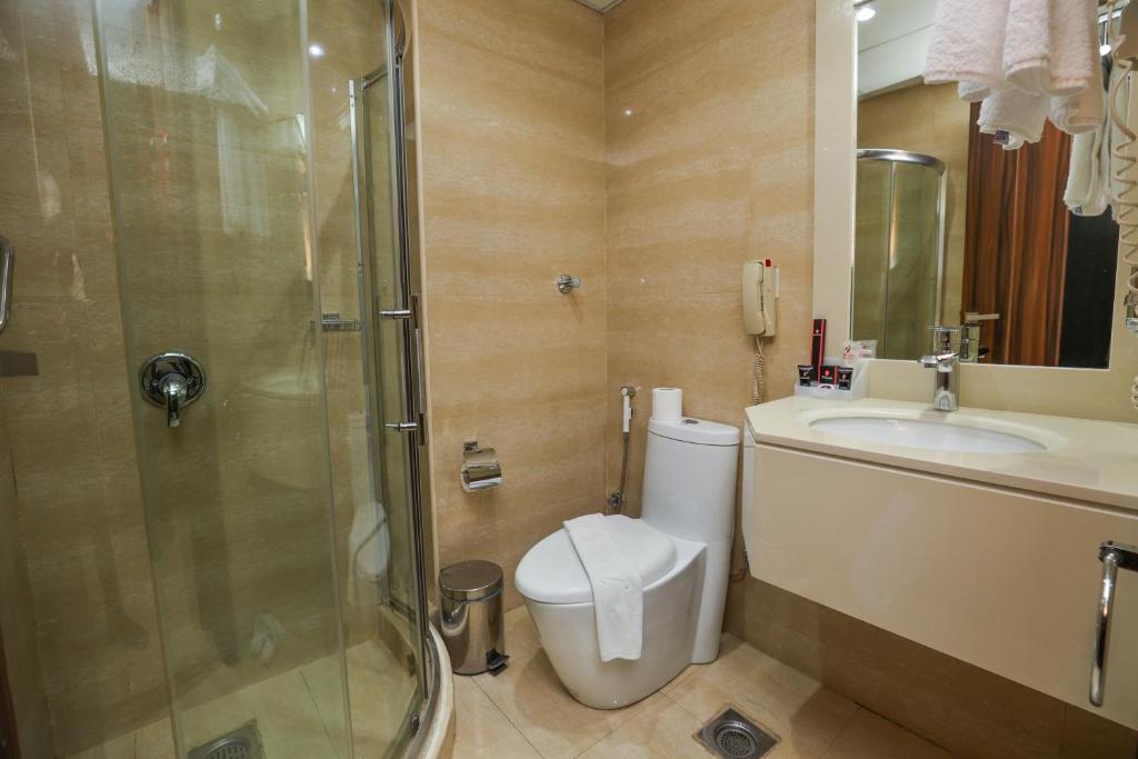 Koupelna v ubytování Reef Global Hotel