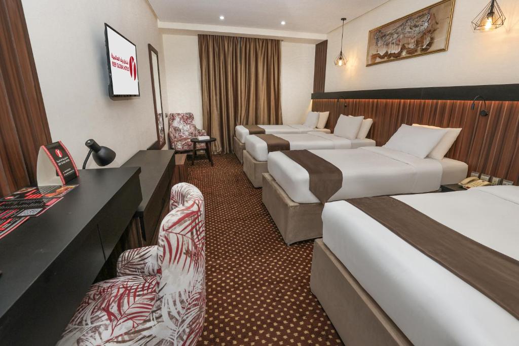 TV a/nebo společenská místnost v ubytování Reef Global Hotel