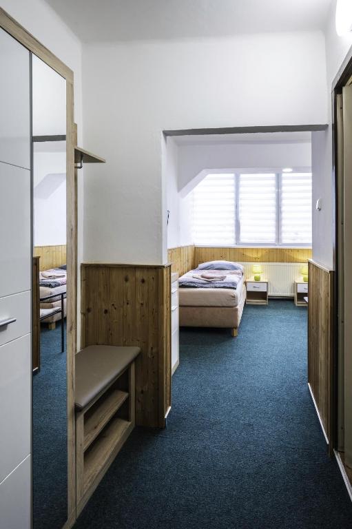 Postel nebo postele na pokoji v ubytování Hotel Bellevue