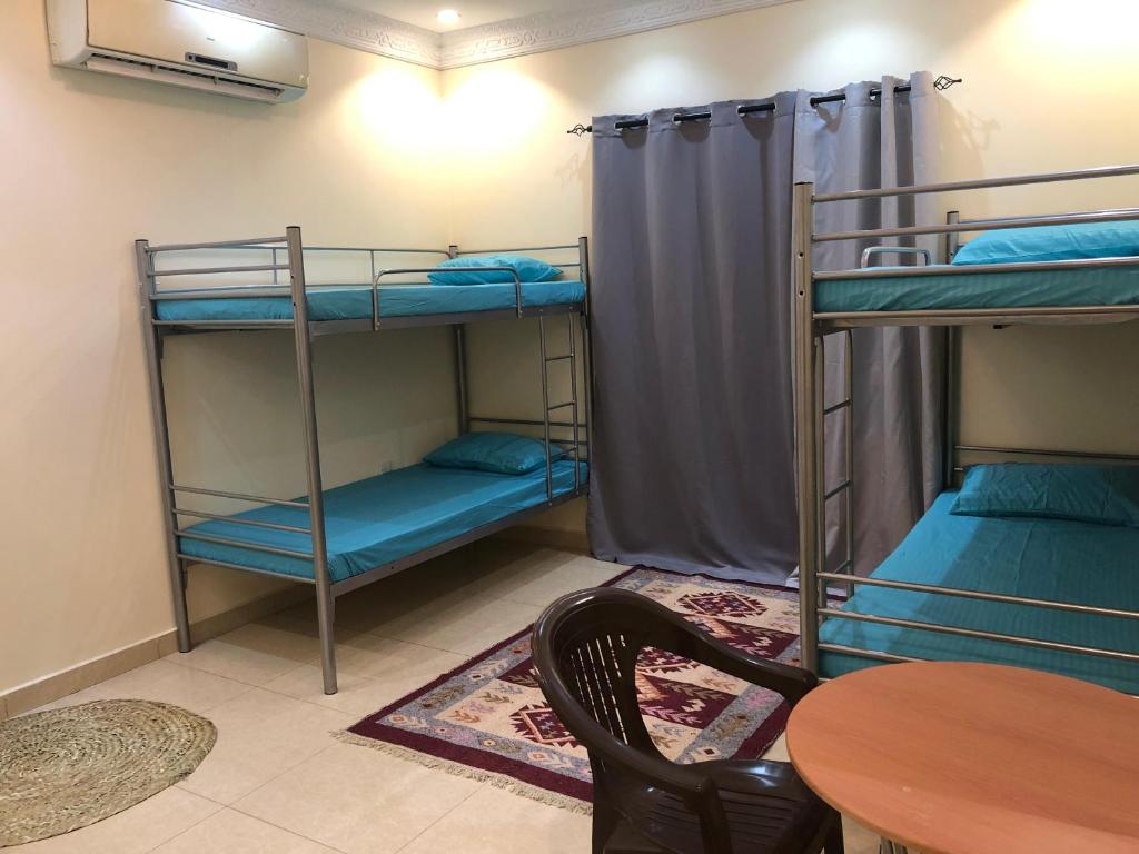 Postel nebo postele na pokoji v ubytování Arabian Hostel