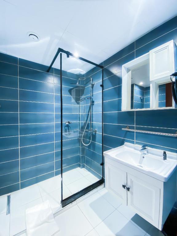 Koupelna v ubytování MANOU HOTEL