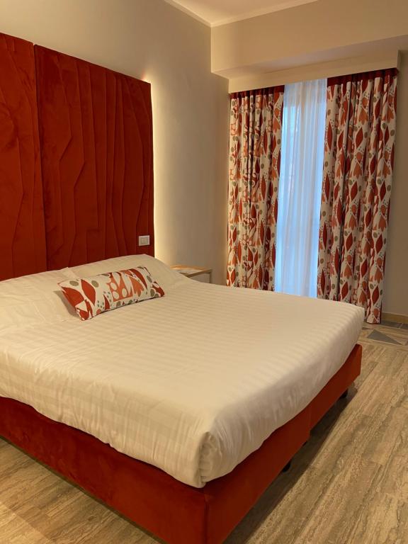 Postel nebo postele na pokoji v ubytování Hotel Sant'Elia