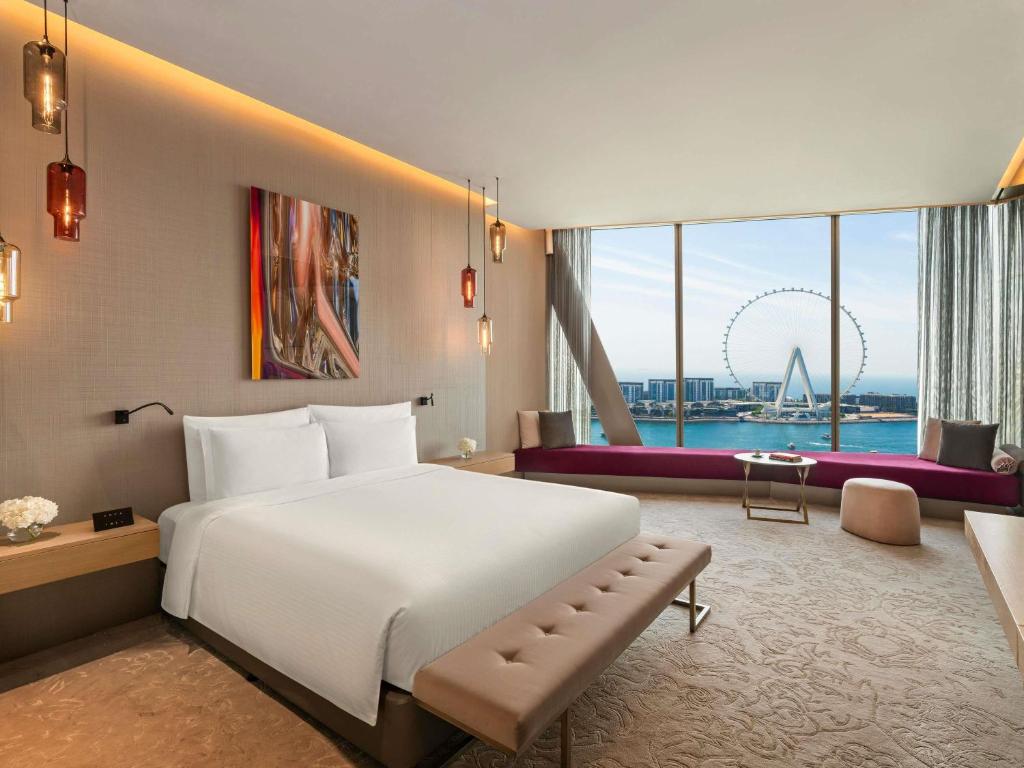 Postel nebo postele na pokoji v ubytování Rixos Premium Dubai JBR