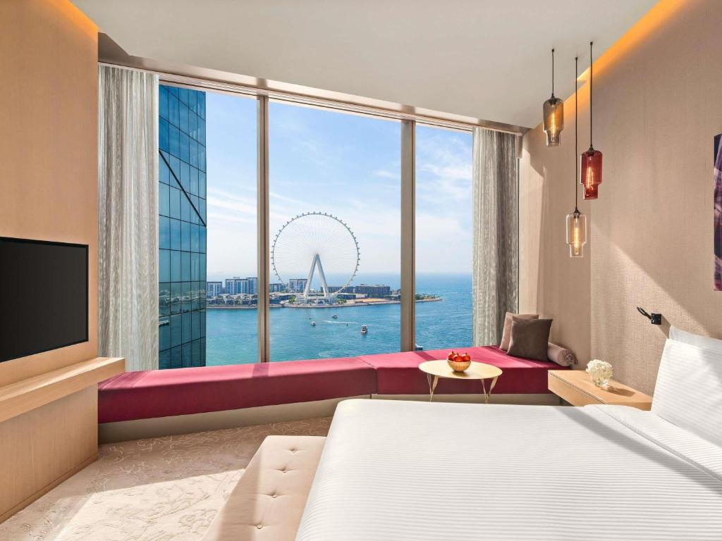 Postel nebo postele na pokoji v ubytování Rixos Premium Dubai JBR