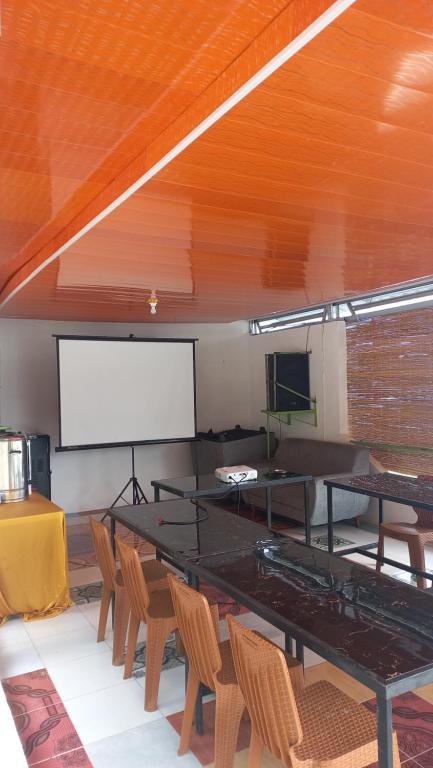 Et tv og/eller underholdning på Pantai Concesso Resort Haranggaol