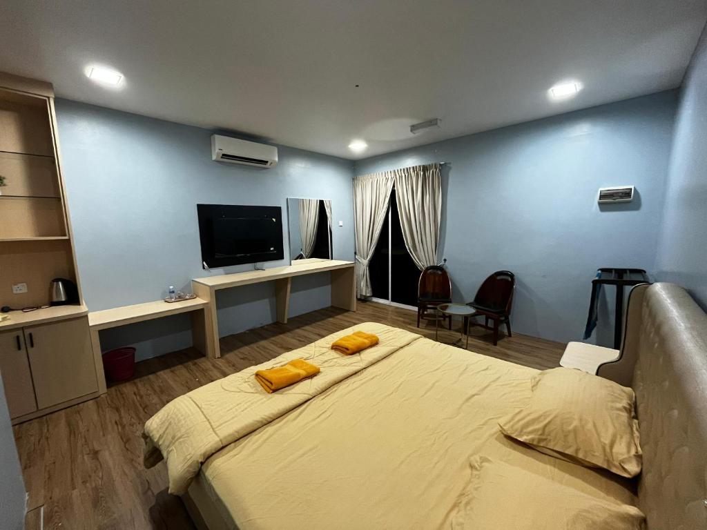 Postel nebo postele na pokoji v ubytování Dalili's resort pulau suri