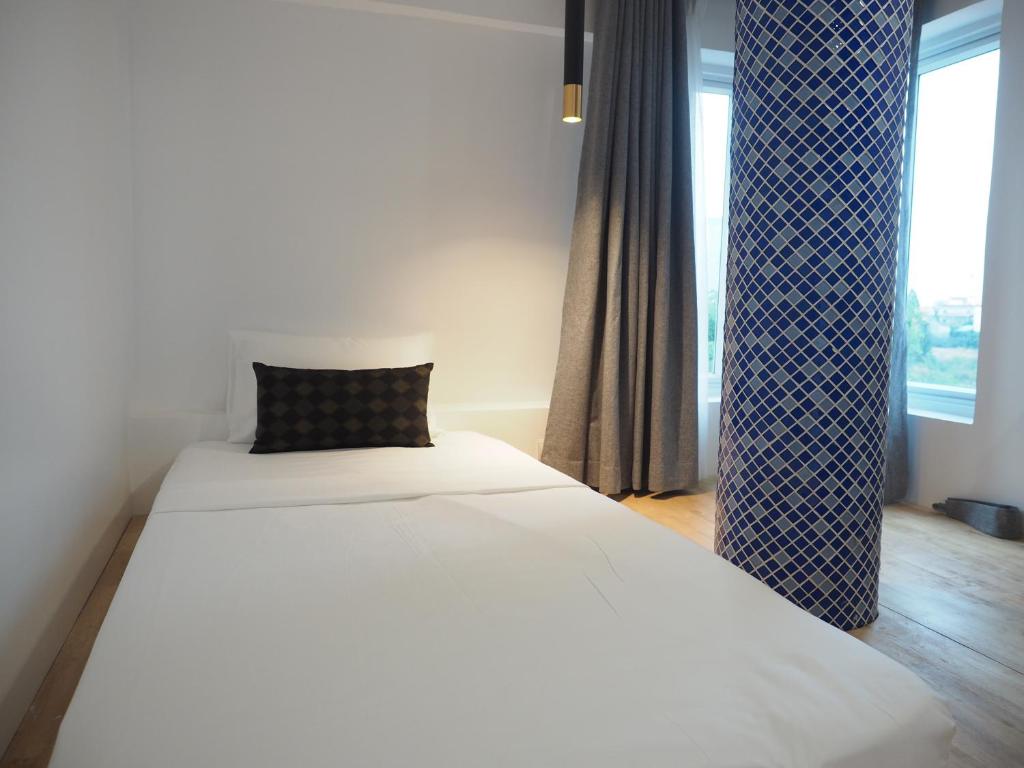 Postel nebo postele na pokoji v ubytování Activate C3 Hostel