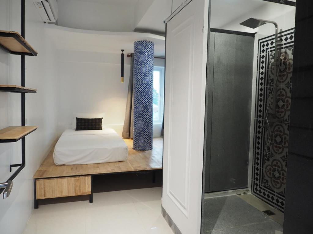 Postel nebo postele na pokoji v ubytování Activate C3 Hostel