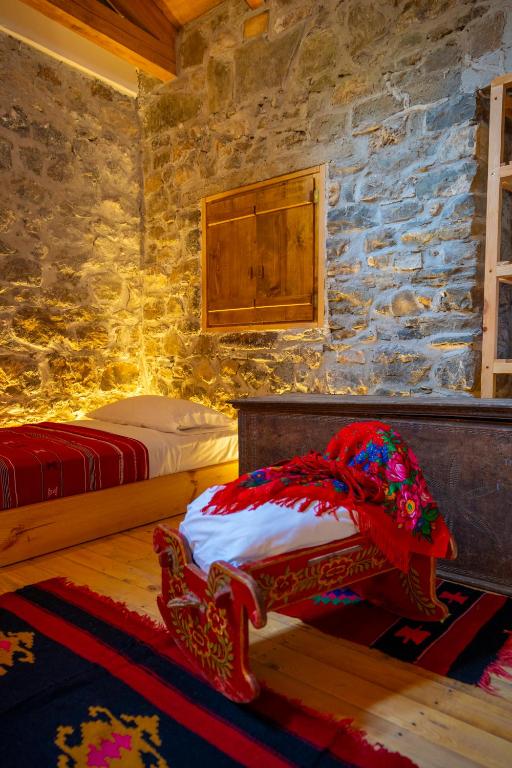Postel nebo postele na pokoji v ubytování BabaNu Guesthouse
