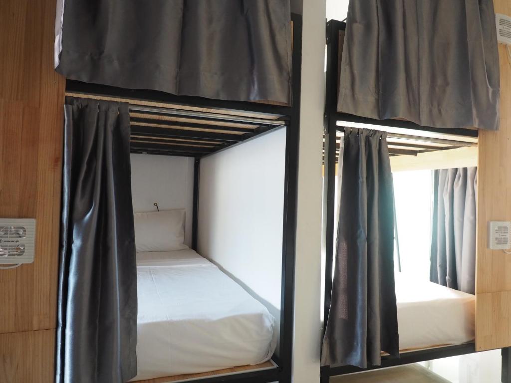 Postel nebo postele na pokoji v ubytování Activate C3 Hostel