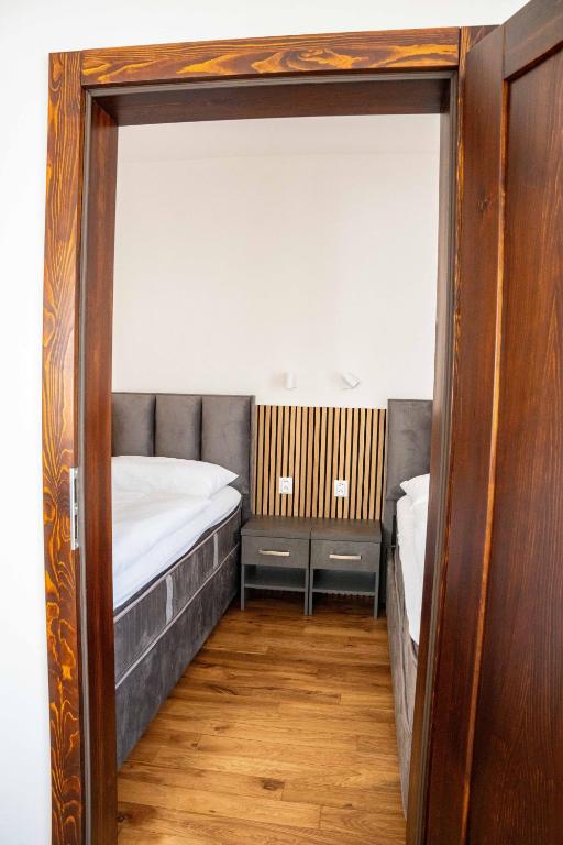 Postel nebo postele na pokoji v ubytování Hotel Sharingham