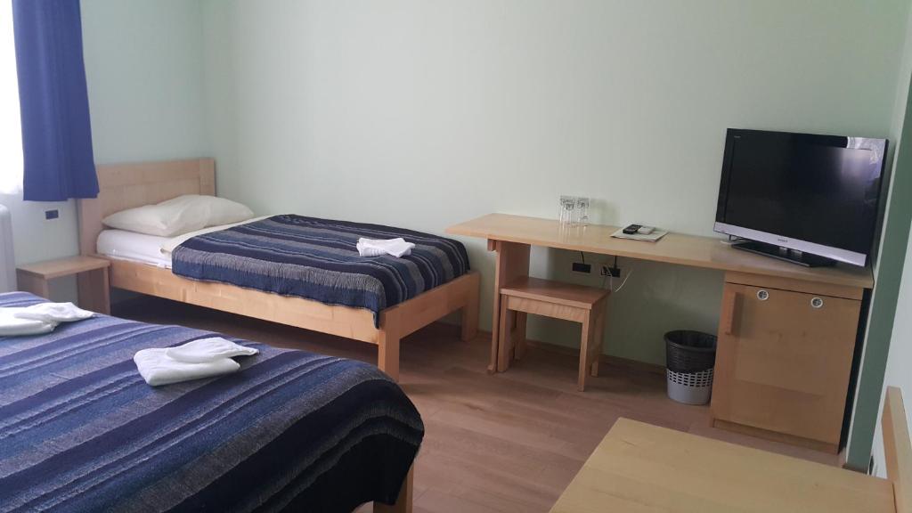 Postel nebo postele na pokoji v ubytování Homestead Vrbin