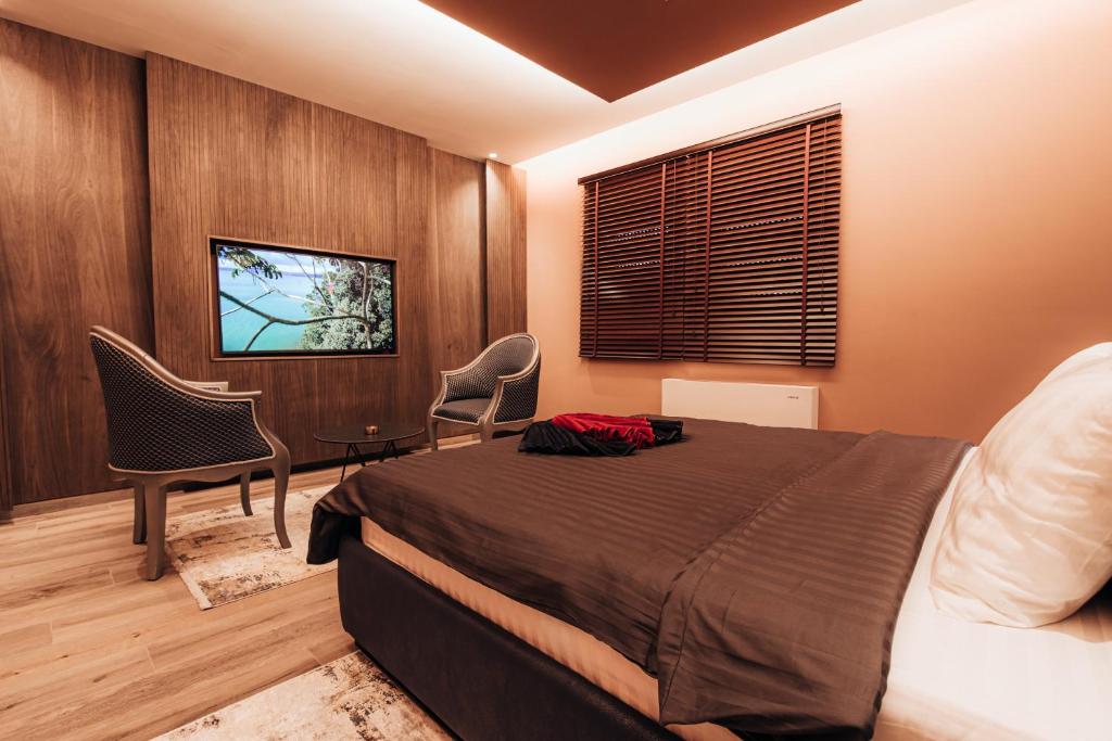 TV a/nebo společenská místnost v ubytování Motel Delphin