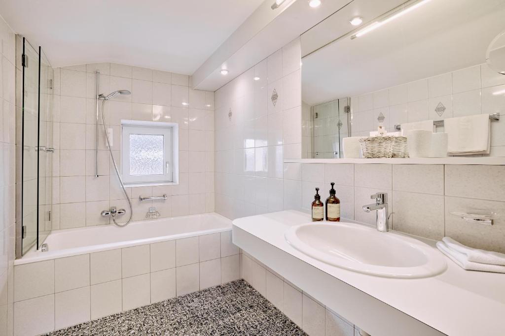 Ванная комната в Hotel Appartement Roggal
