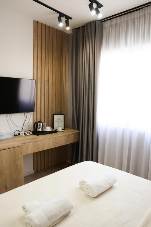 Postel nebo postele na pokoji v ubytování Sol Hotel