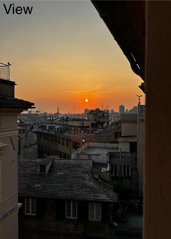 a view from a window of a city at sunset at Genova Antica in Genoa