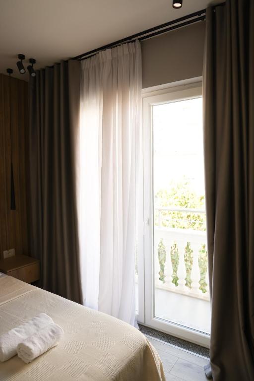 Postel nebo postele na pokoji v ubytování Sol Hotel