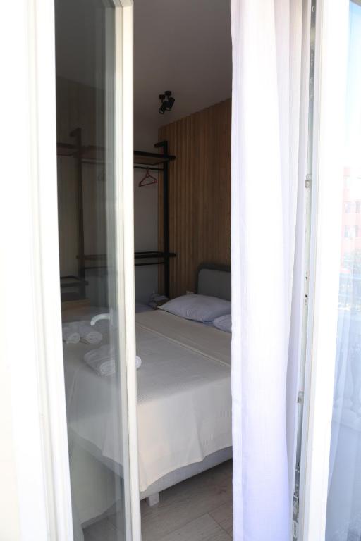 Postel nebo postele na pokoji v ubytování Sol Hotel