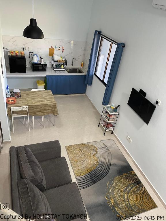 Kuchyň nebo kuchyňský kout v ubytování Homestay Studio TOKAYOH