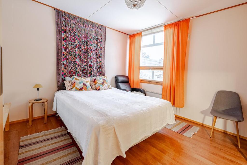 Ένα ή περισσότερα κρεβάτια σε δωμάτιο στο Bungalow house flat in Rekola 33m2