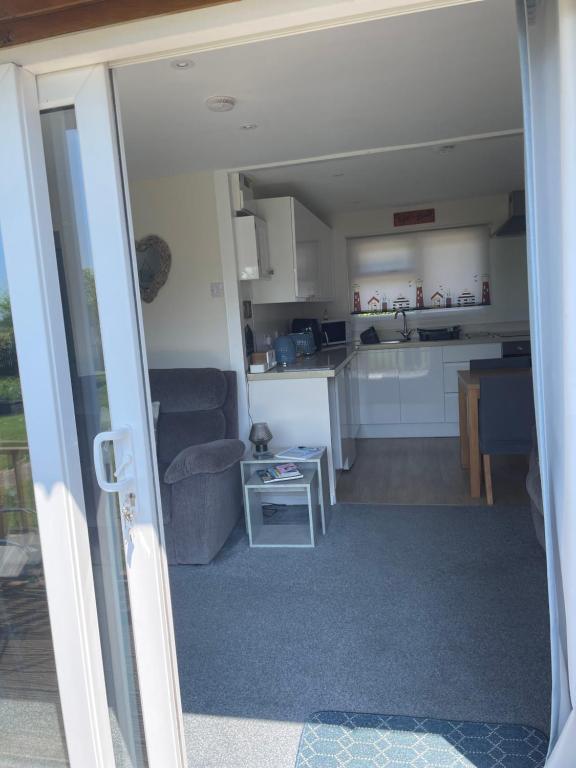 Kuchyň nebo kuchyňský kout v ubytování Margaret Ann Chalet