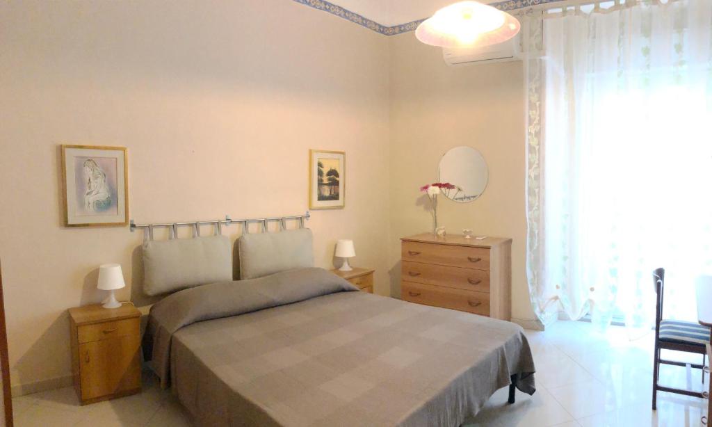 Posteľ alebo postele v izbe v ubytovaní Apartment for 2 in Catania, B&B Le voci del mercato