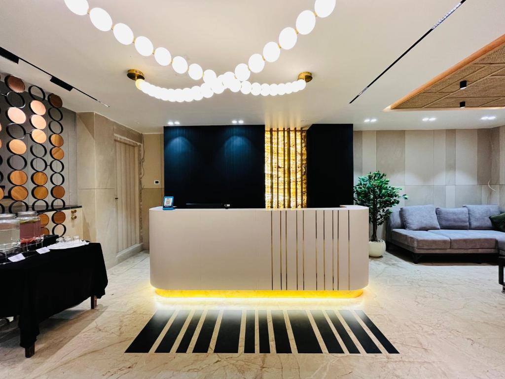 Posezení v ubytování Shankar Bhavan By Vinayak Hotels