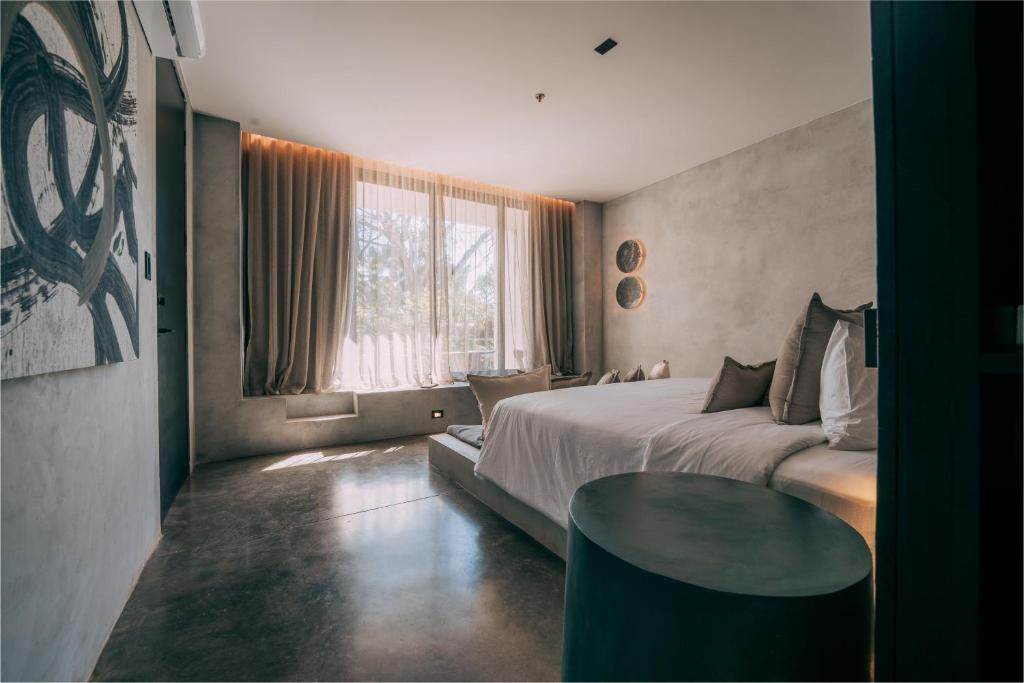 Postel nebo postele na pokoji v ubytování Esh Hotel