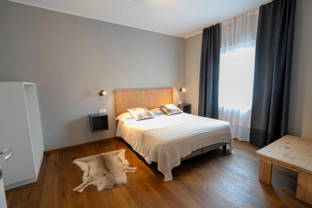 Postel nebo postele na pokoji v ubytování Condhotel Fanti